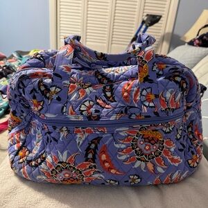 Vera Bradley grand travel bag in a purple floral pattern